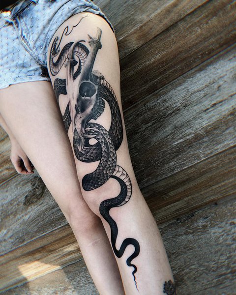 Что означает татуировка змея для мужчин? Тату змея, значение для девушек